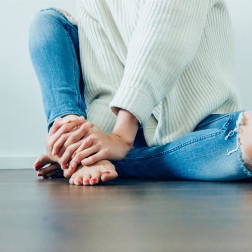 girl sitting on floor